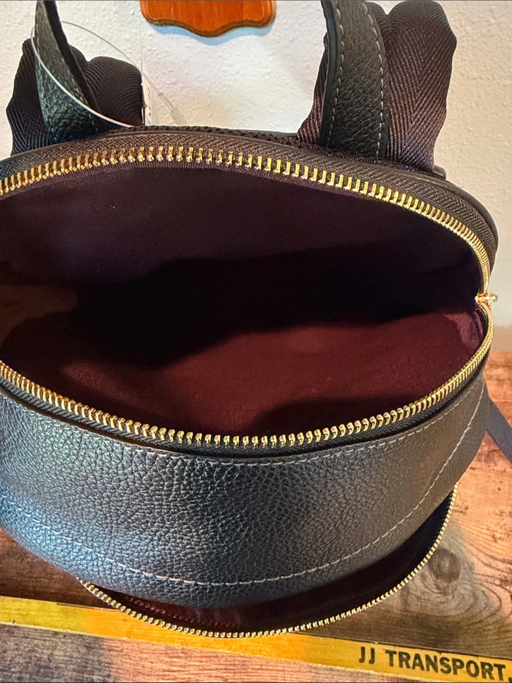 Coach Black Pebbled Leather Backpack with Gold-Tone Accents